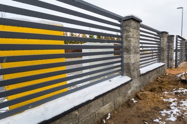 Concrete and Panels Interchange fence idea