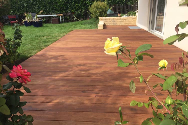 Decking is a great way to upgrade your patio and it gives you a choice between natural or composite wood