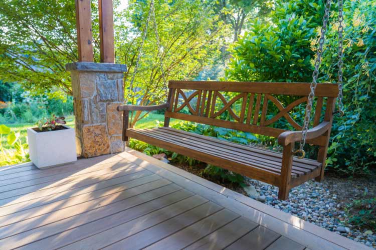 A cozy front porch is the final touch to a true farmhouse facade