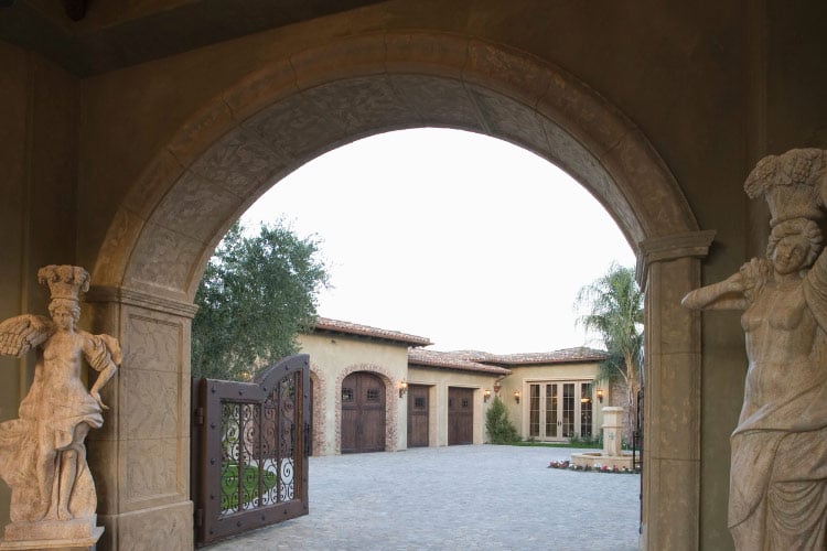 With an arched entryway framing the start of your driveway, you are making it an experience and not just an entrance