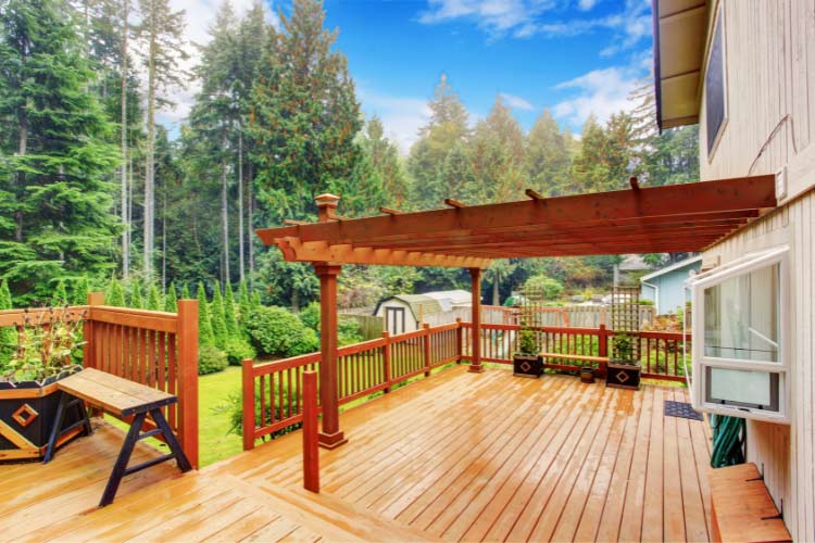 Add a pergola overlook to your hillside yard to create a striking architectural feature
