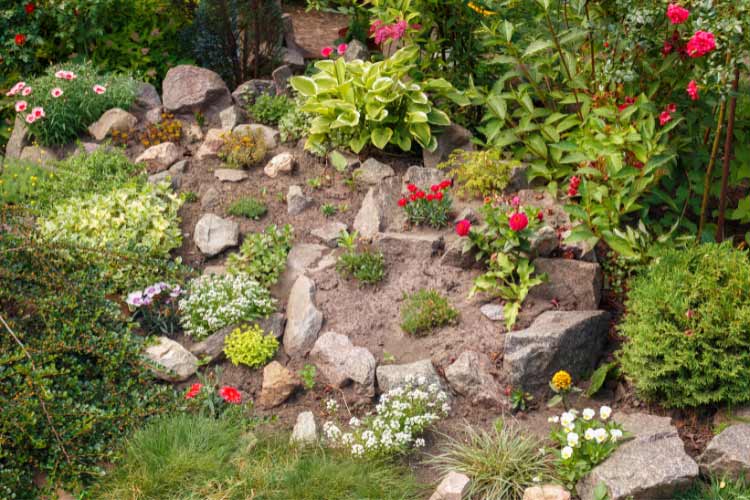 Rock gardens enhance terraced slopes while providing soil stability