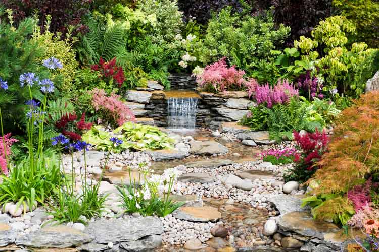 River rocks are the perfect material to bring a water feature to life