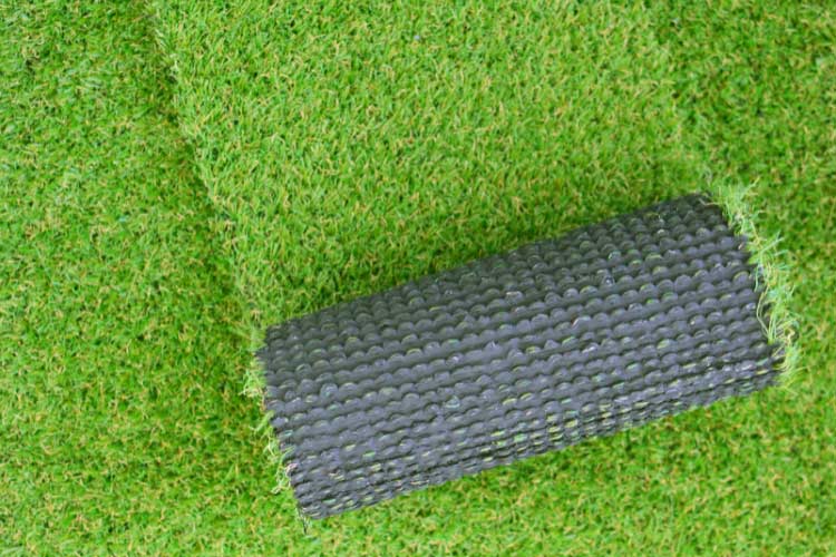 Artificial grass can transform your uneven backyard into a smooth surface in an instant