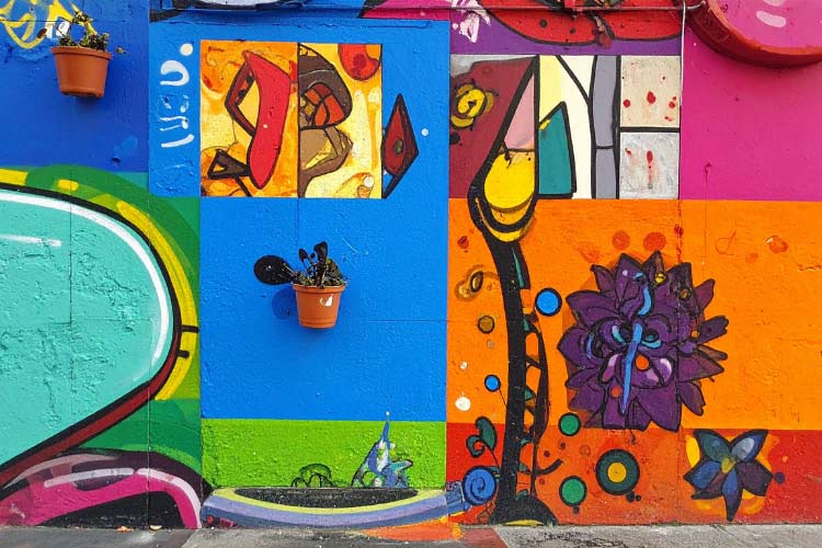 You can transform your backyard with a fence mural