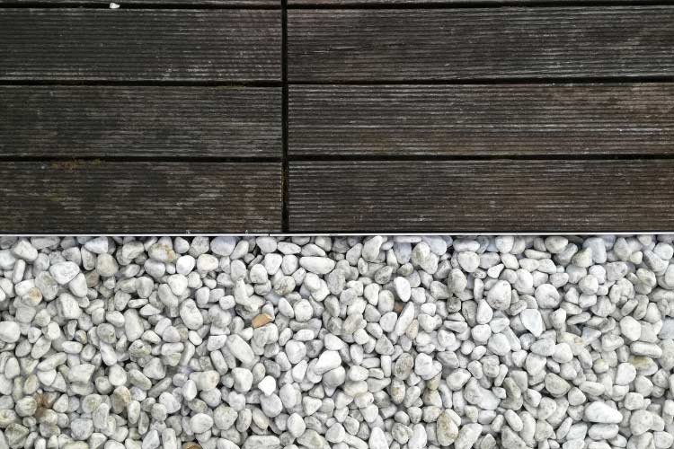 helps with drainage and weed prevention if you use landscape fabric underneath