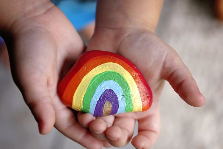 Paint individual rocks in bright hues