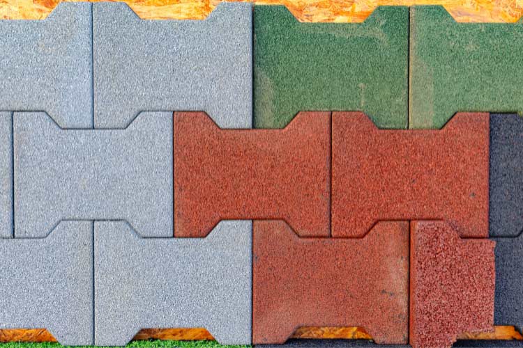 Rubber would be the cheapest option and it is both practical and forgiving