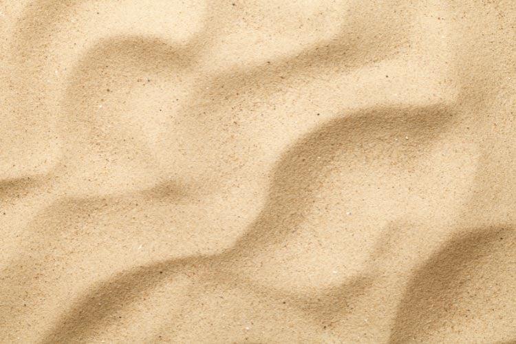 Sand creates a beachy feel that absorbs spills and feels very comfortable underfoot