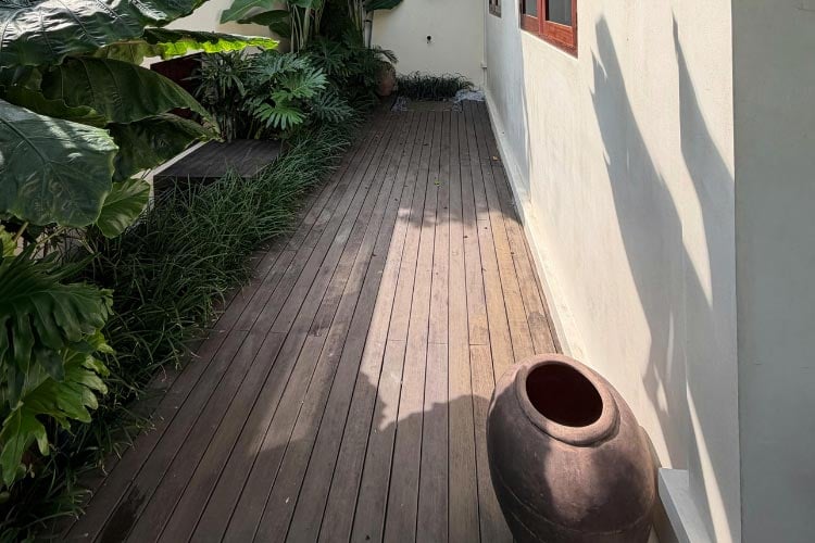 You can turn your small backyard into an outdoor room with wood decking
