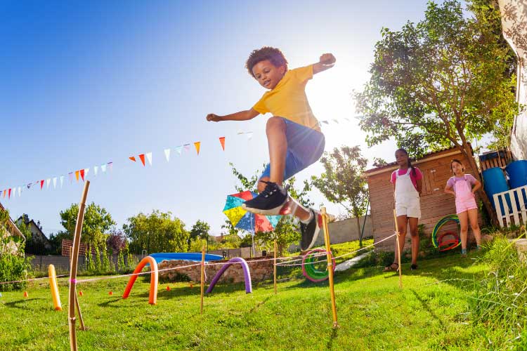 Turn the slope into a mini obstacle course that has balance beams running sideways