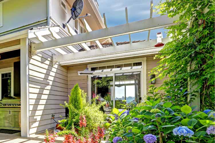 the same goes for a pergola over a sliding door or any other type of entryway