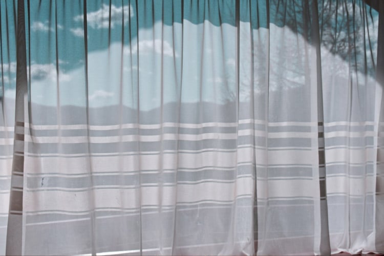 Outdoor curtains made from weather-resistant fabrics do a good job at creating instant privacy