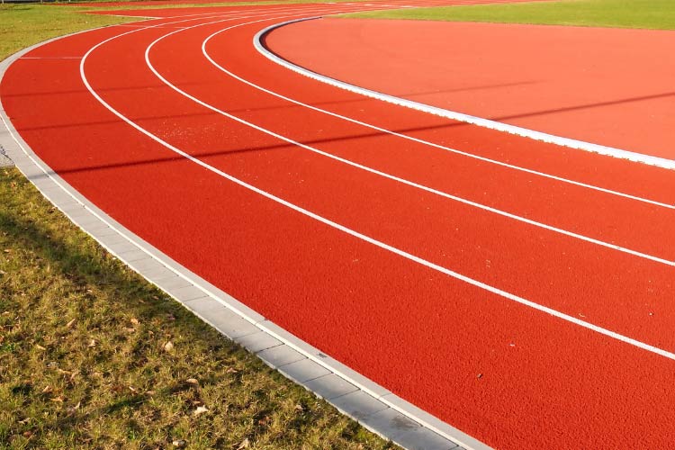 Create a winding path that snakes up and down the hill into a loop that creates an endless circuit for bikes