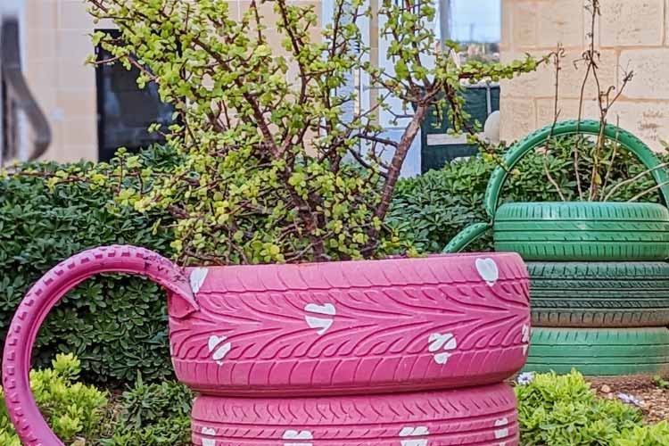 A couple of tires stacked on top of each other filled with nothing but soil is one of the best hacks